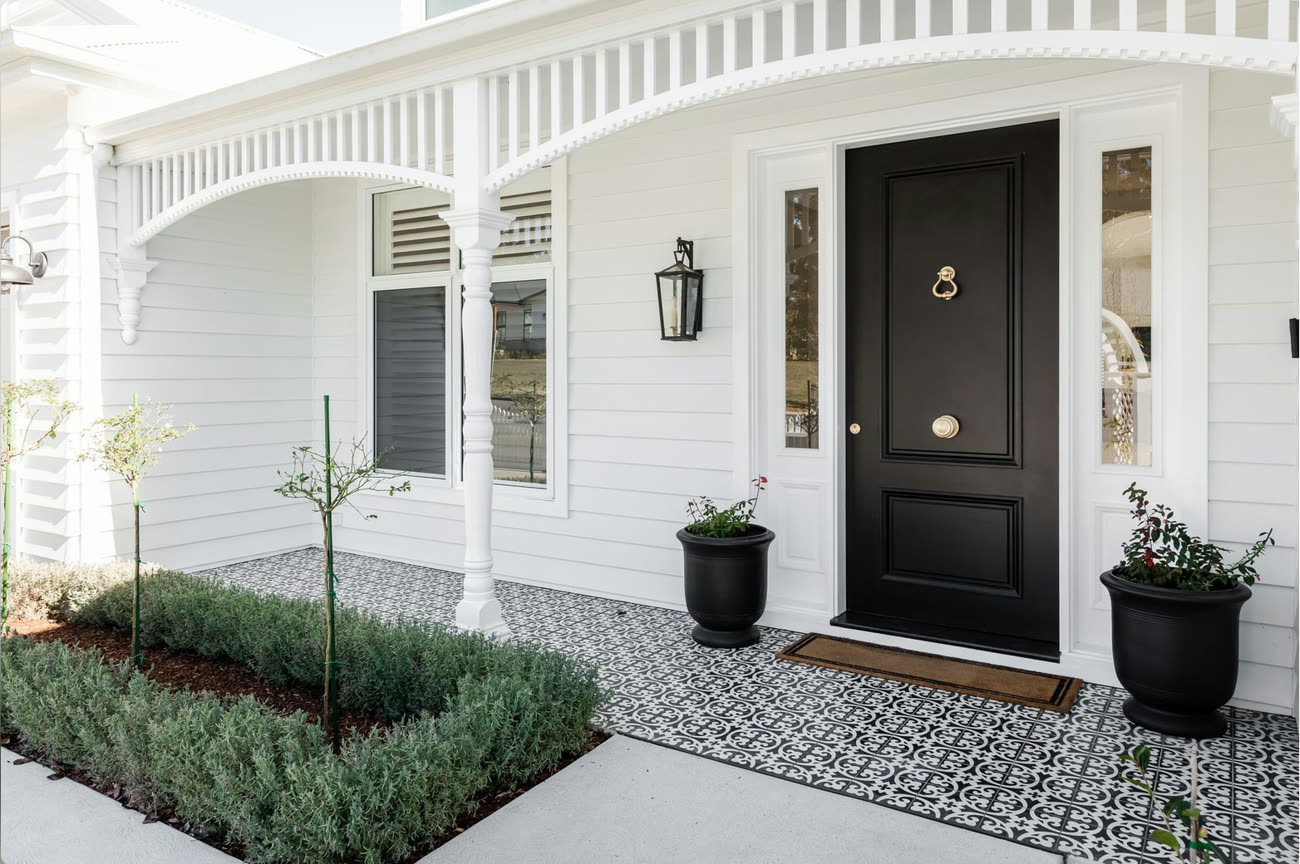 Outdoor timber fretwork on a two-storey verandah